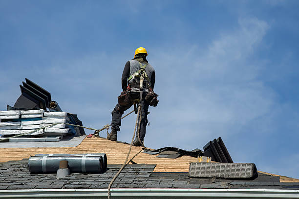 Professional Roofing technician working in Shirley, NY